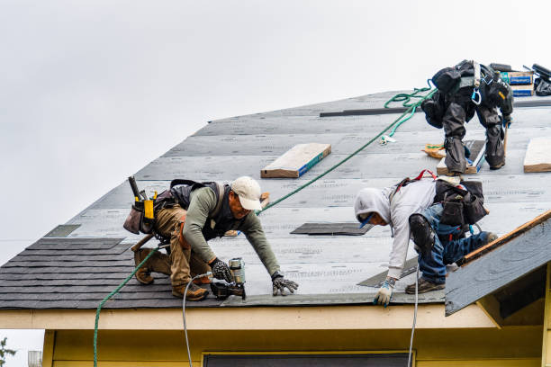 Professional Gutter Installation technician working in Aurora, OR